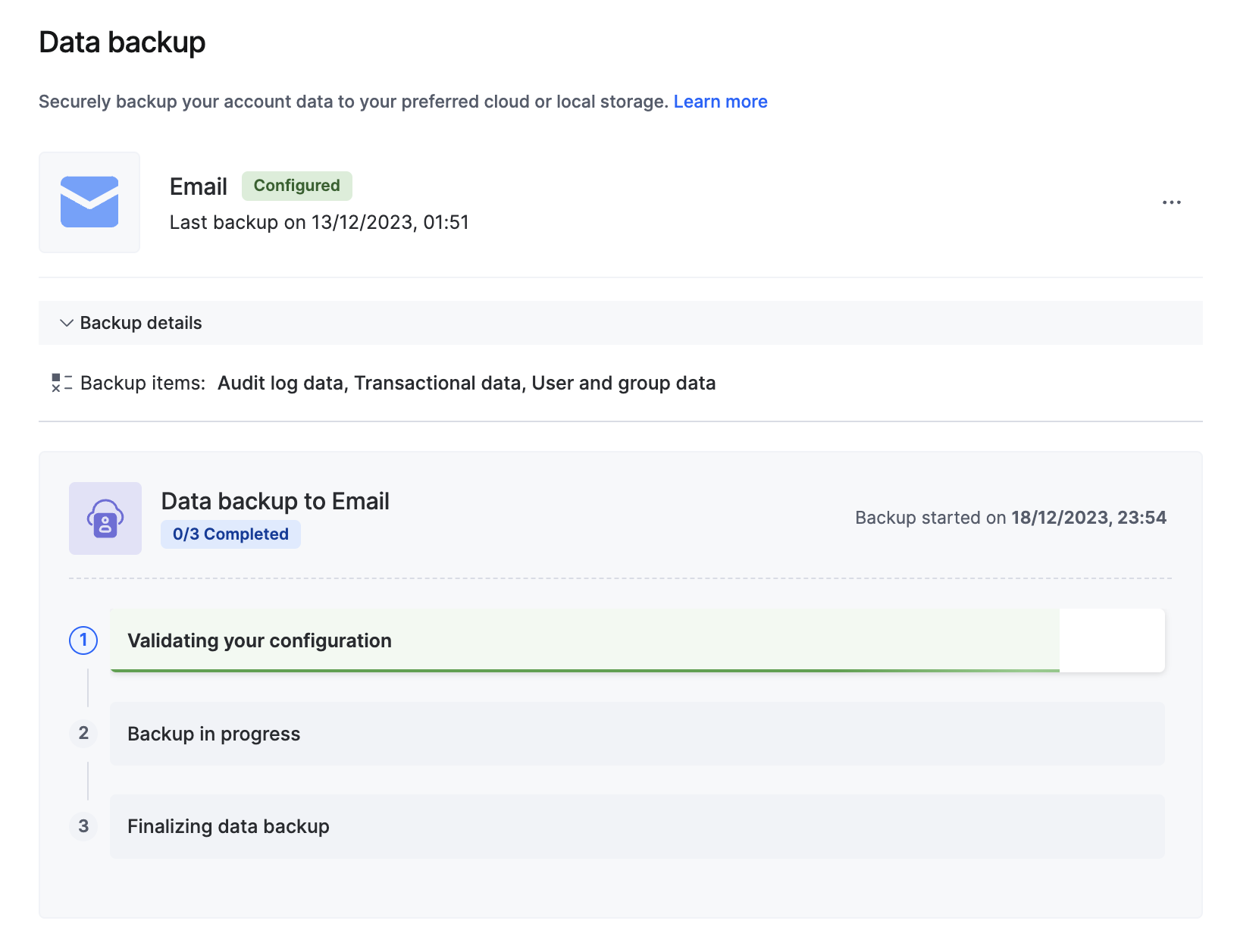 Data backup page showing real-time progress through validating configuration, backup in progress, and finalizing data backup